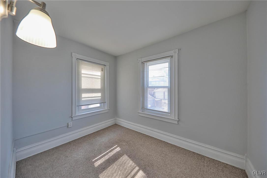 641 7th Avenue Bethlehem, PA 18018 - Photo 18 of 29 an empty room with windows and closet