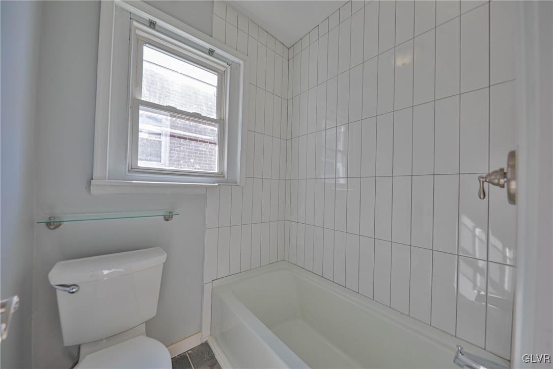 641 7th Avenue Bethlehem, PA 18018 - Photo 20 of 29 a bathroom with a toilet and tub
