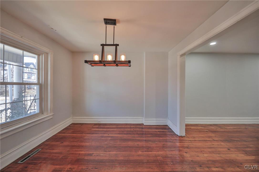 641 7th Avenue Bethlehem, PA 18018 - Photo 4 of 29 a view of empty room with wooden floor and window