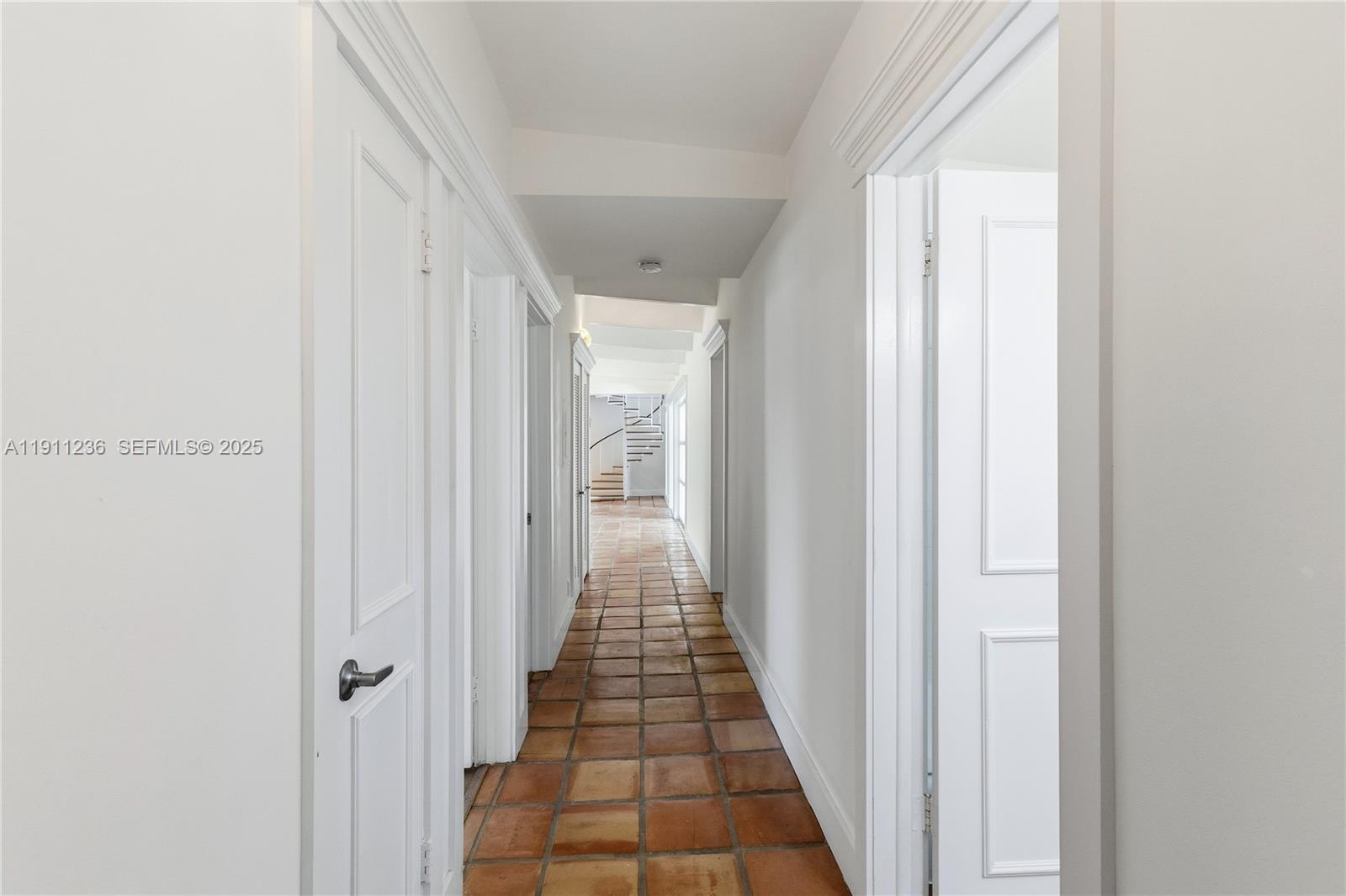 4 Harbor Point Key Biscayne, FL 33149 - Photo 14 of 30 a view of a hallway with a white walls