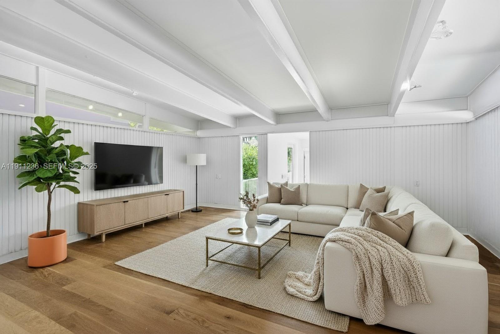 4 Harbor Point Key Biscayne, FL 33149 - Photo 20 of 30 a living room with furniture and a flat screen tv