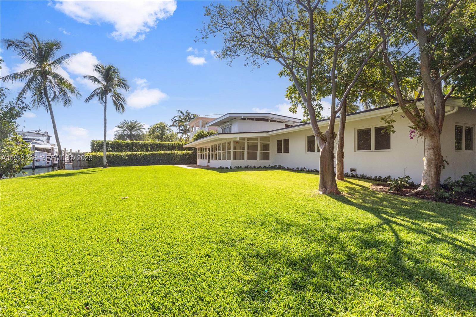 4 Harbor Point Key Biscayne, FL 33149 - Photo 24 of 30 a view of outdoor space yard and swimming pool