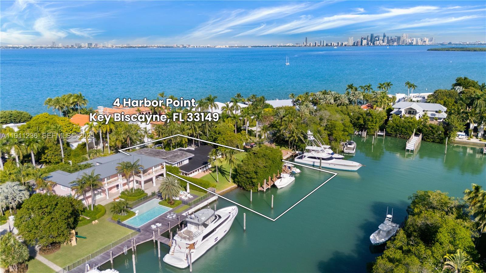 4 Harbor Point Key Biscayne, FL 33149 - Photo 28 of 30 a view of a lake with houses