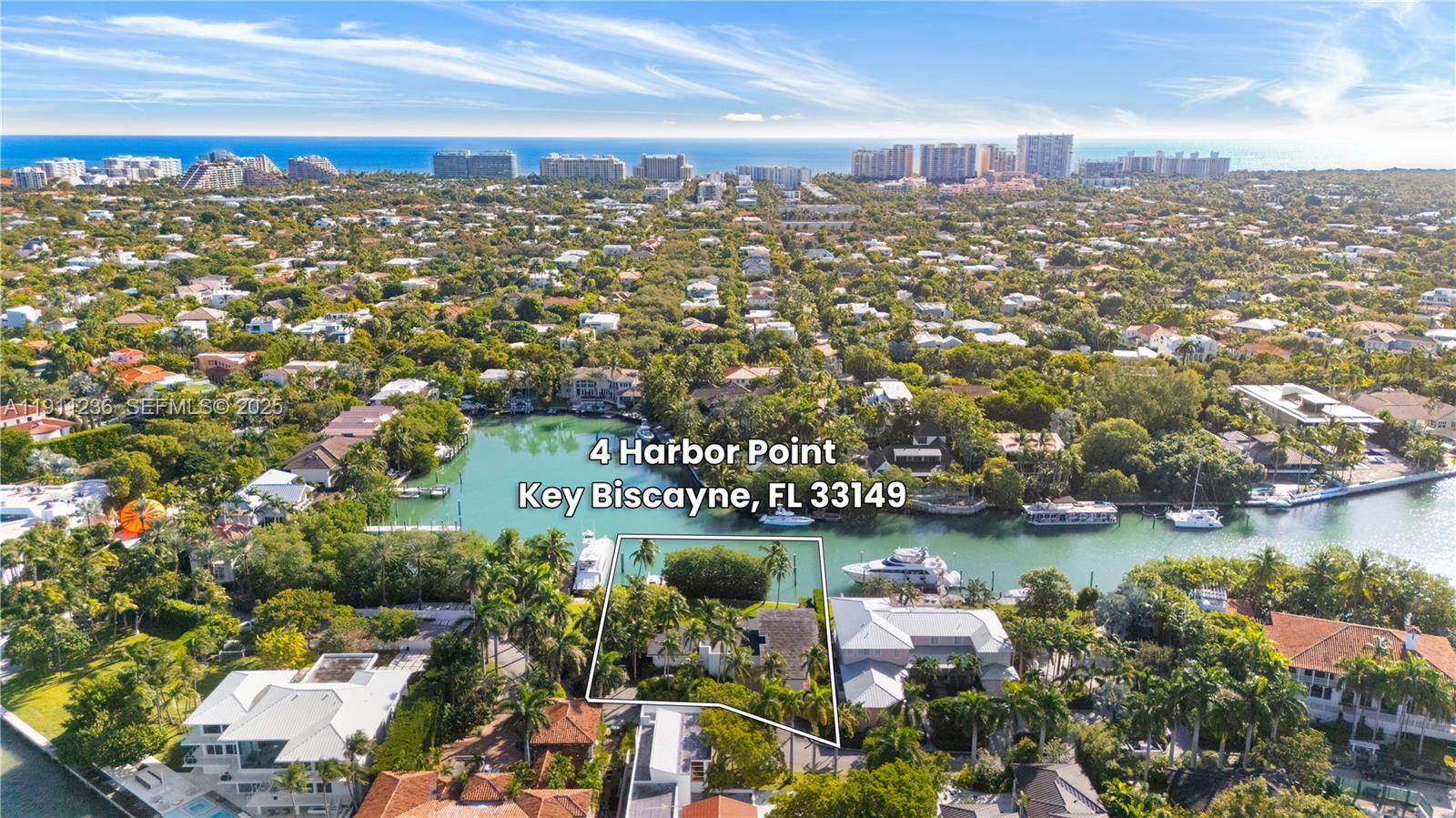 4 Harbor Point Key Biscayne, FL 33149 - Photo 30 of 30 an aerial view of a city with lots of residential buildings ocean and mountain view in back