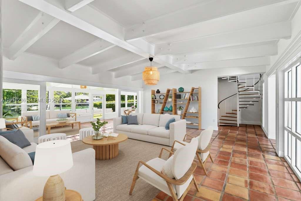 4 Harbor Point Key Biscayne, FL 33149 - Photo 6 of 30 a living room with fireplace furniture and a large window