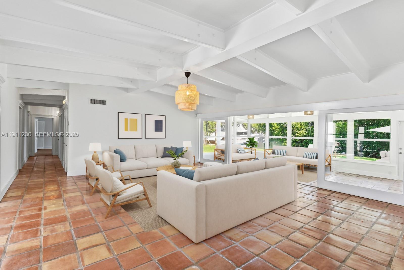 4 Harbor Point Key Biscayne, FL 33149 - Photo 7 of 30 a living room with furniture and a large window