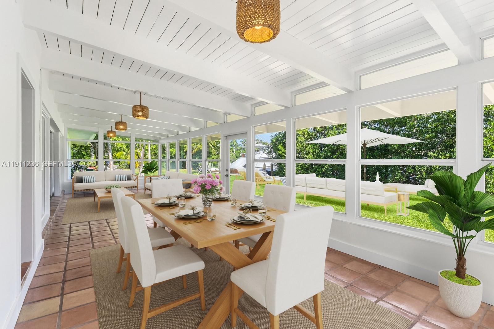 4 Harbor Point Key Biscayne, FL 33149 - Photo 8 of 30 a view of a dining room with furniture window and outside view