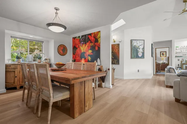 a bedroom with furniture and a fireplace