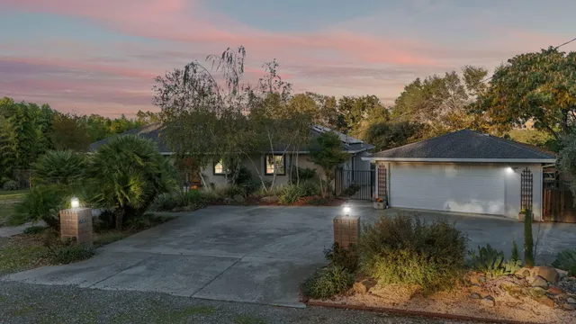 a view of a back yard of the house