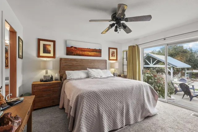 a view of a house with sitting area and garden