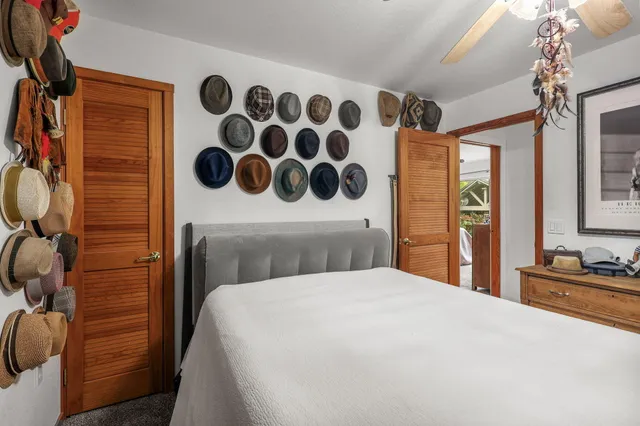 a view of a swimming pool with outdoor seating