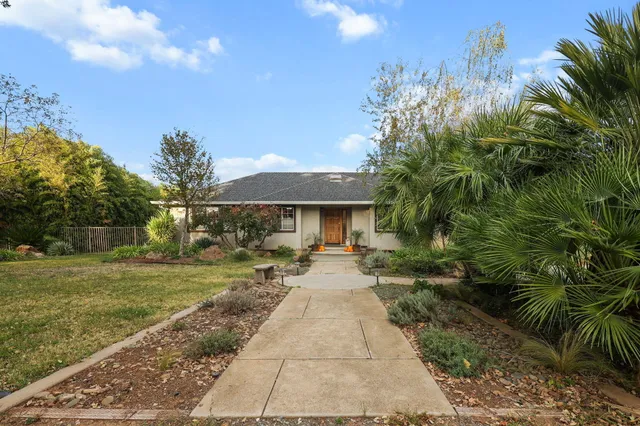 a lobby with furniture and window