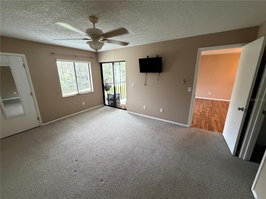 274 Cypress Lane Oldsmar, FL 34677 - Photo 14 of 19 a view of an empty room with a window