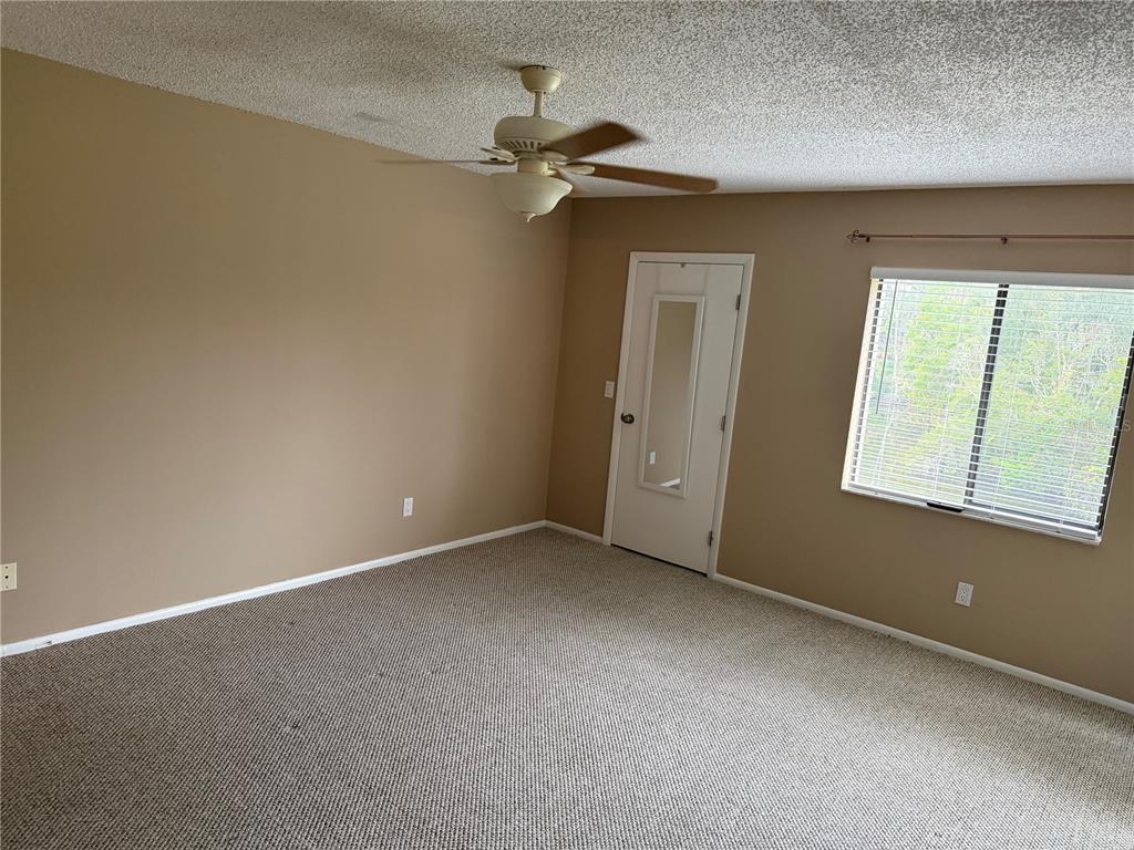 274 Cypress Lane Oldsmar, FL 34677 - Photo 15 of 19 an empty room with a window