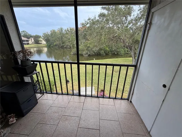 a view of washer and dryer with wooden floor
