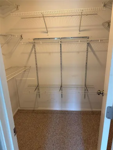 a bathroom with a shower and a bath tub