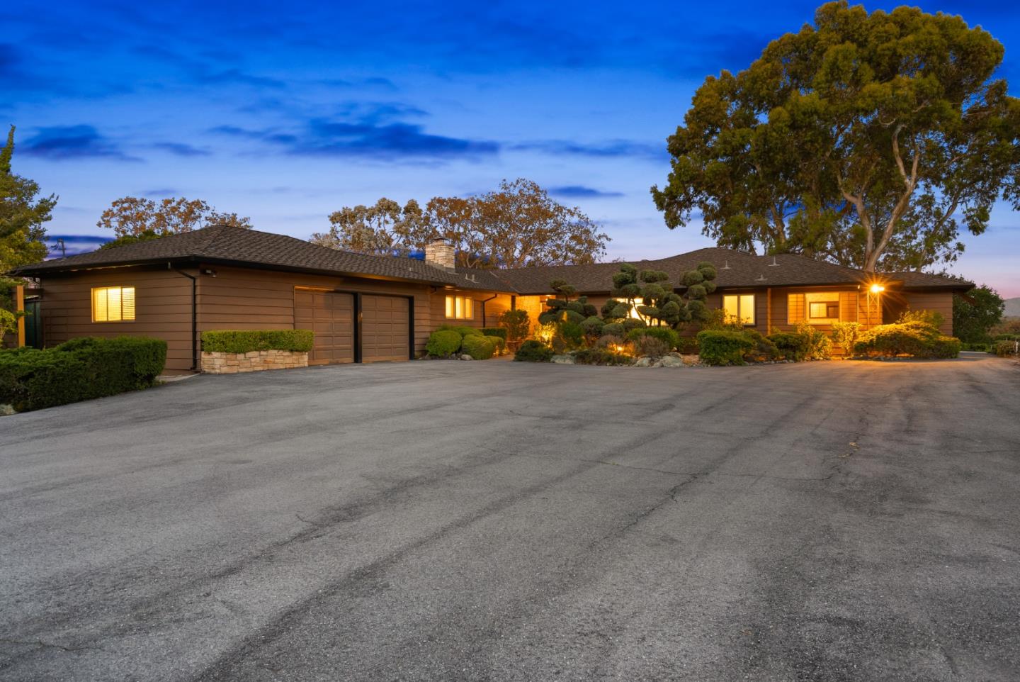 a view of a house with a street