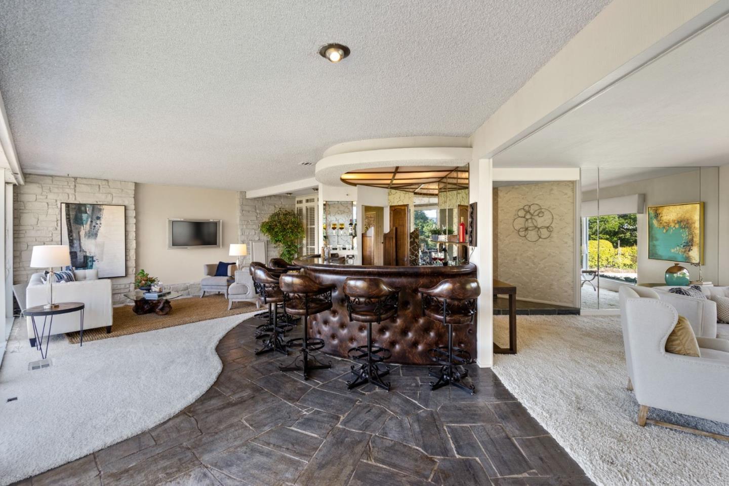 130 Lynn Way Woodside, CA 94062 - Photo 11 of 47 a living room with furniture and a dining table with wooden floor