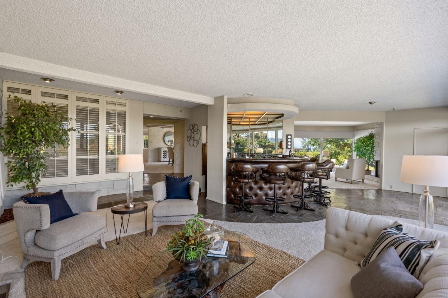 130 Lynn Way Woodside, CA 94062 - Photo 12 of 47 a living room with furniture and a large window