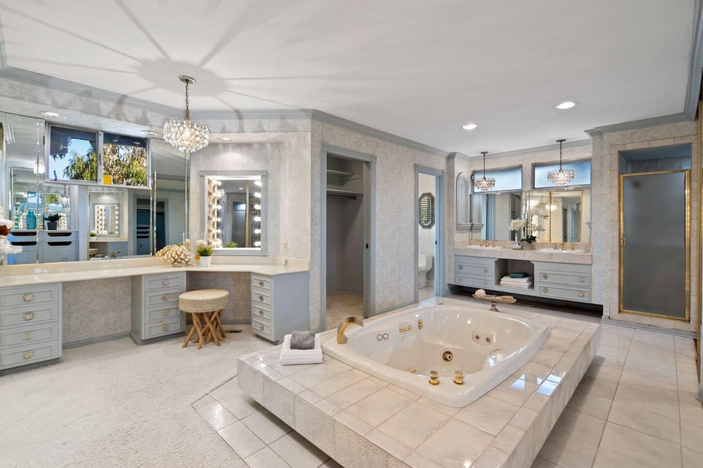 130 Lynn Way Woodside, CA 94062 - Photo 26 of 47 a living room with furniture and a chandelier