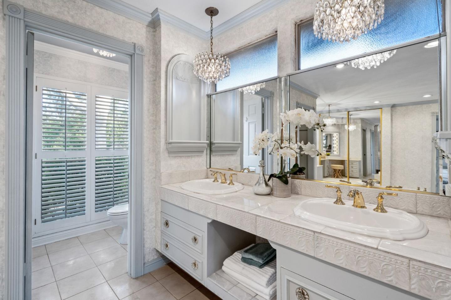 130 Lynn Way Woodside, CA 94062 - Photo 28 of 47 a bathroom with a double vanity sink and a mirror