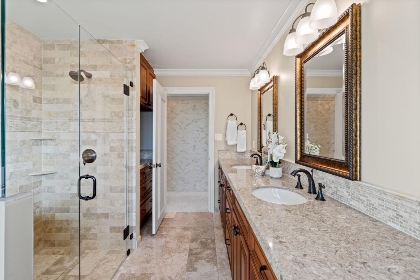 130 Lynn Way Woodside, CA 94062 - Photo 33 of 47 a bathroom with a granite countertop sink mirror and shower