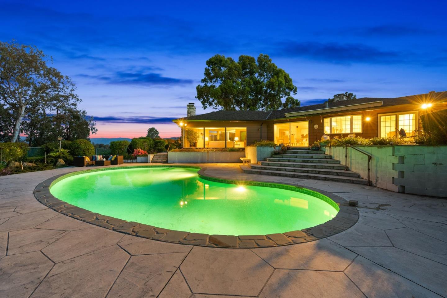 130 Lynn Way Woodside, CA 94062 - Photo 35 of 47 a view of a swimming pool with a yard