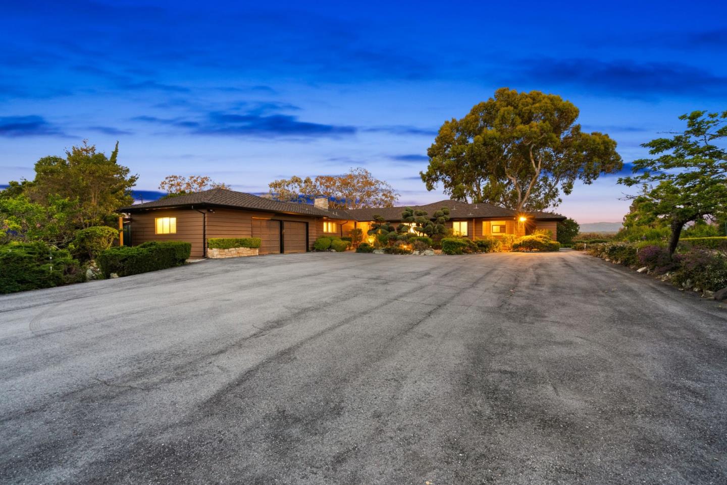 130 Lynn Way Woodside, CA 94062 - Photo 4 of 47 a front view of a house with a yard and mountain view