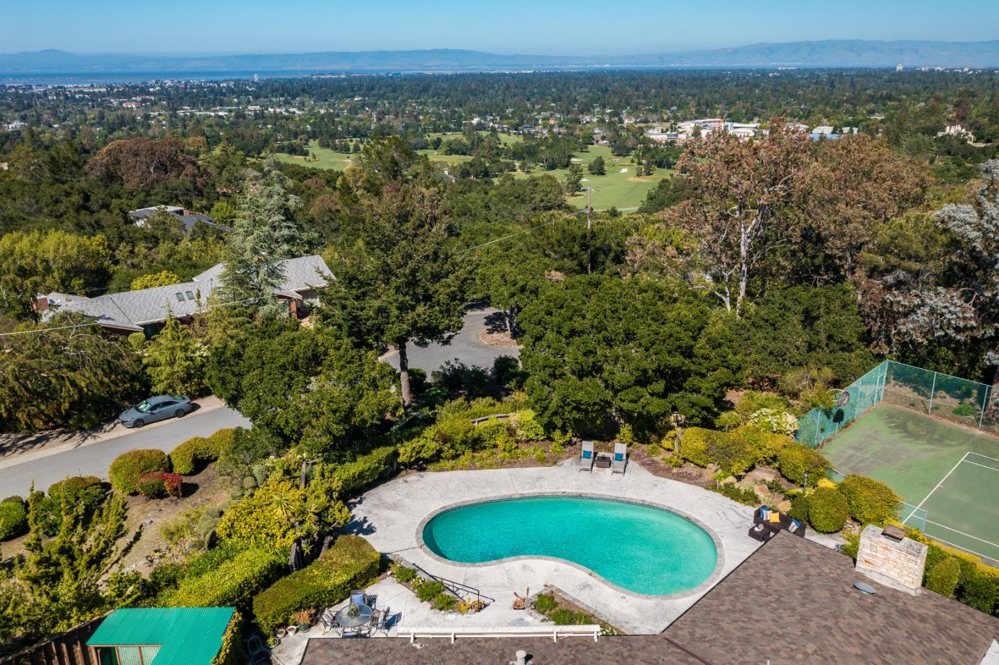 130 Lynn Way Woodside, CA 94062 - Photo 46 of 47 an aerial view of a house with a yard