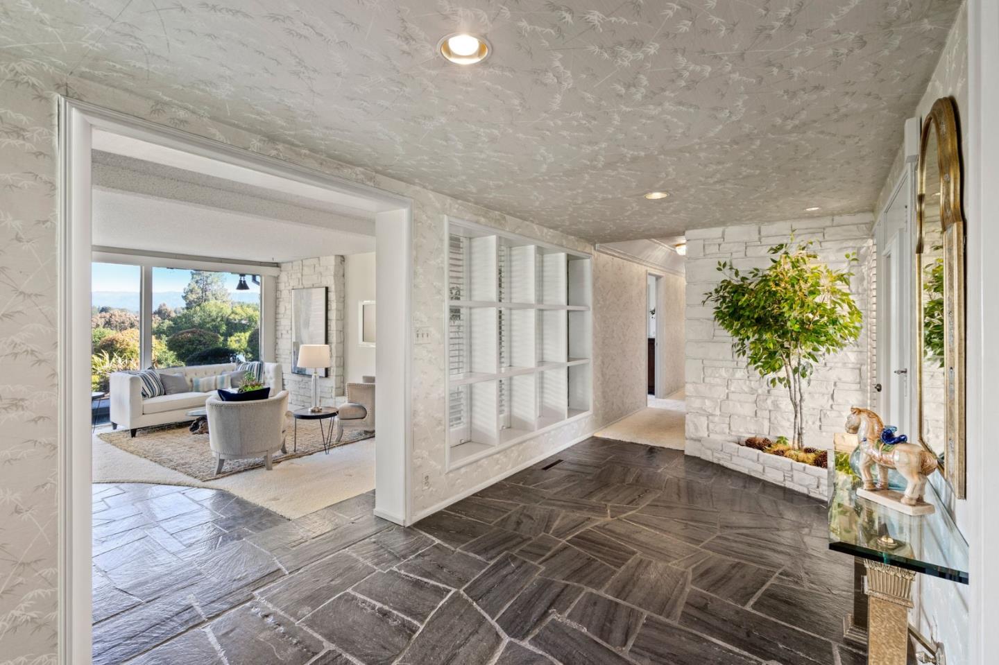 130 Lynn Way Woodside, CA 94062 - Photo 8 of 47 a living room with furniture and a large window