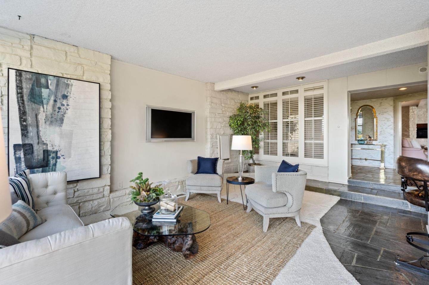 130 Lynn Way Woodside, CA 94062 - Photo 9 of 47 a living room with furniture and a flat screen tv