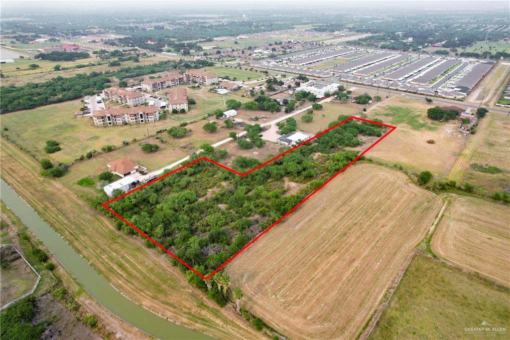 1015 South Shary Road Mission, TX 78573 - Photo 2 of 10 an aerial view of residential houses with outdoor space