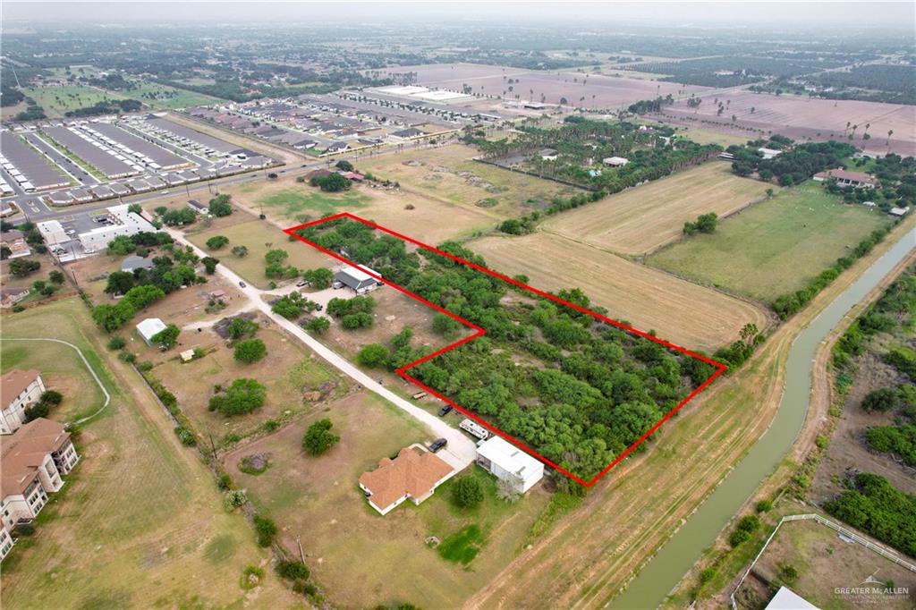 1015 South Shary Road Mission, TX 78573 - Photo 9 of 10 an aerial view of residential houses with outdoor space
