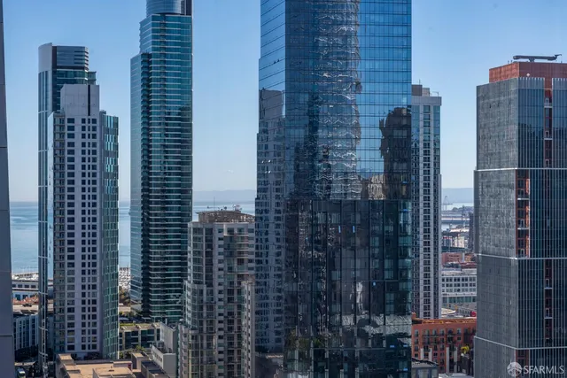 a view of a city with tall buildings