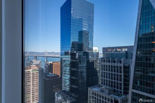 a view of a balcony with city view