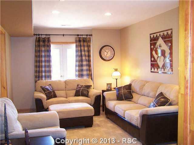 1110 Timber Ridge Road Divide, CO 80814 - Photo 8 of 20 Den also has Walk Out to Lower Level Patio Area and Recessed Lighting.