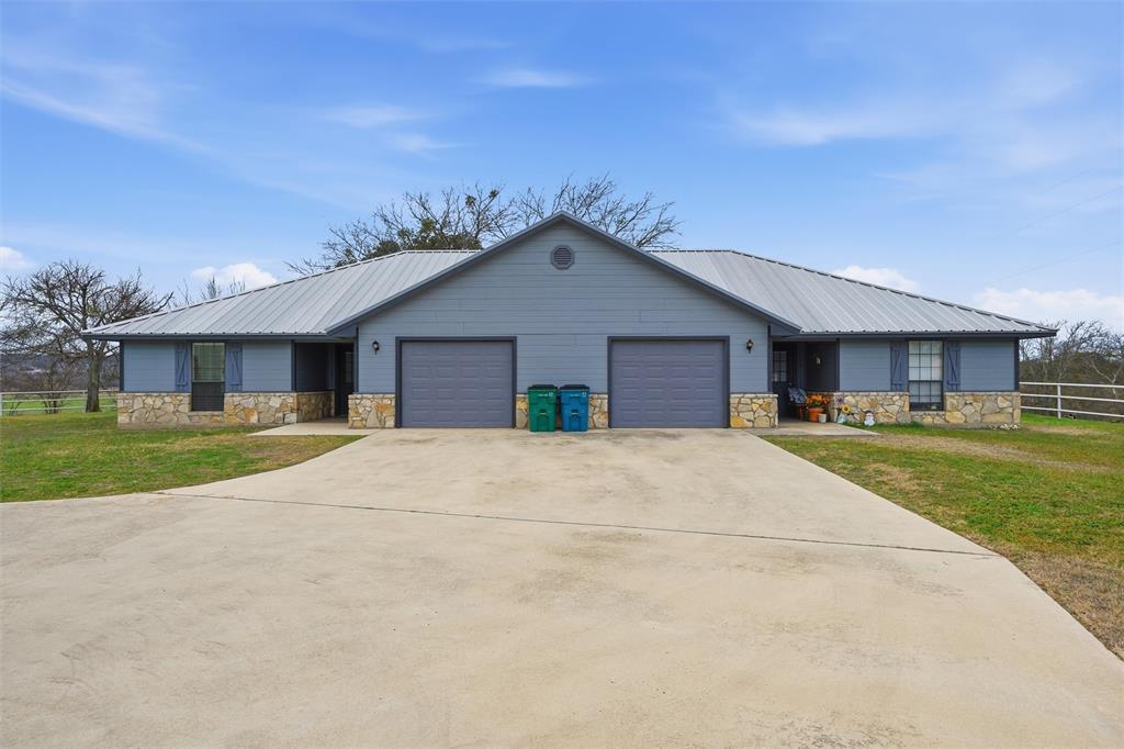 710 Erath Street Meridian, TX 76665 - Photo 3 of 26 a front view of a house with a yard
