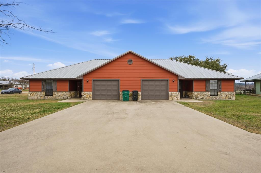 710 Erath Street Meridian, TX 76665 - Photo 7 of 26 a front view of a house with a yard