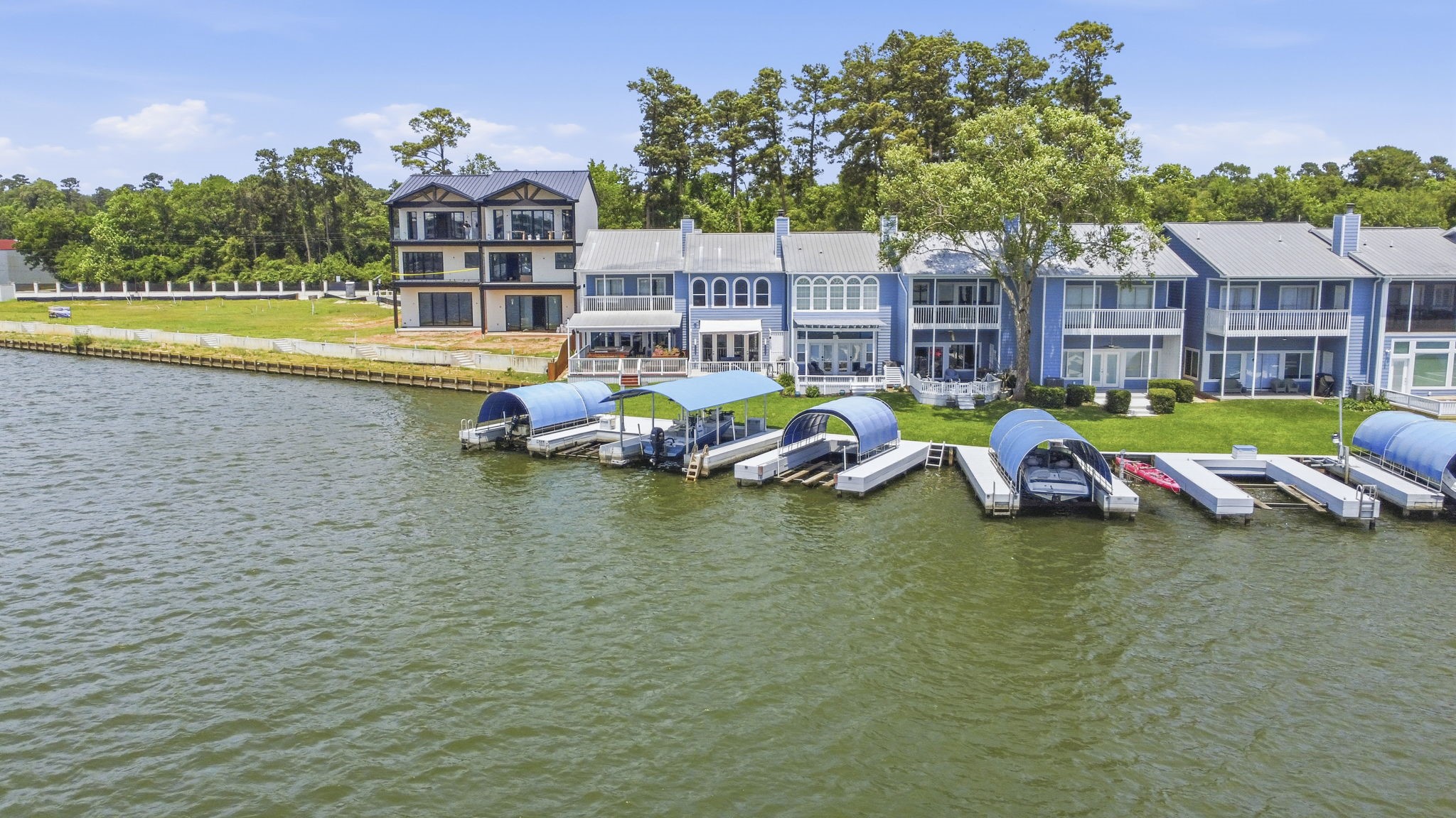 2 Key Harbour Conroe, TX 77356 - Photo 41 of 41 a view of a house with pool and chairs