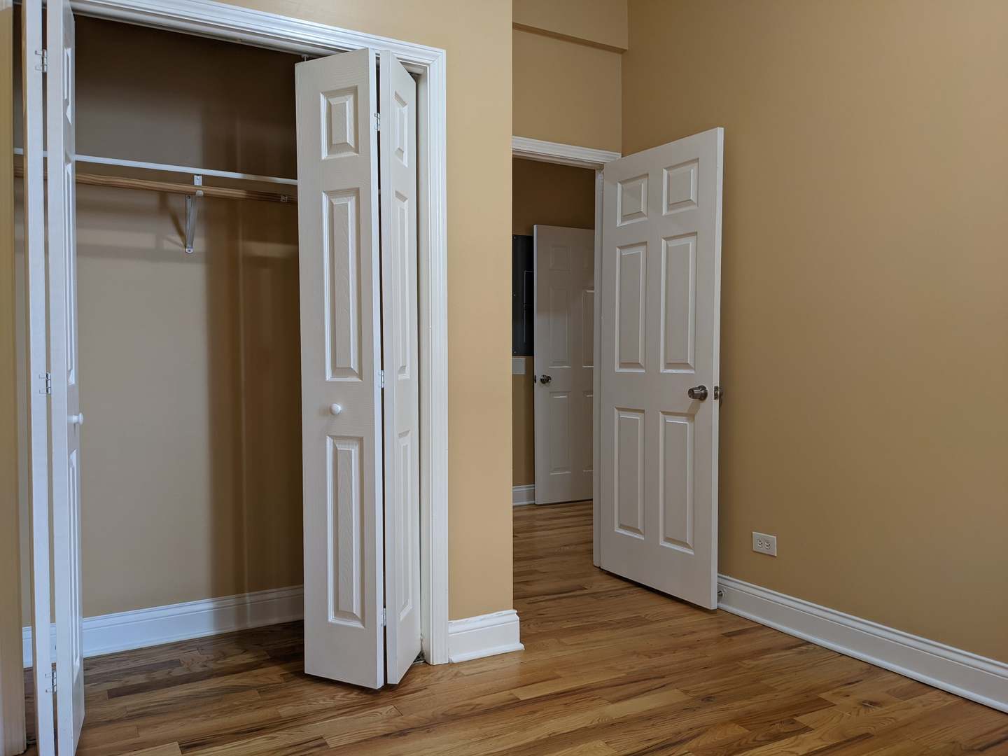 712 South Aberdeen Street, Unit 1A Chicago, IL 60607 - Photo 26 of 28 a view of an empty room with wooden floor