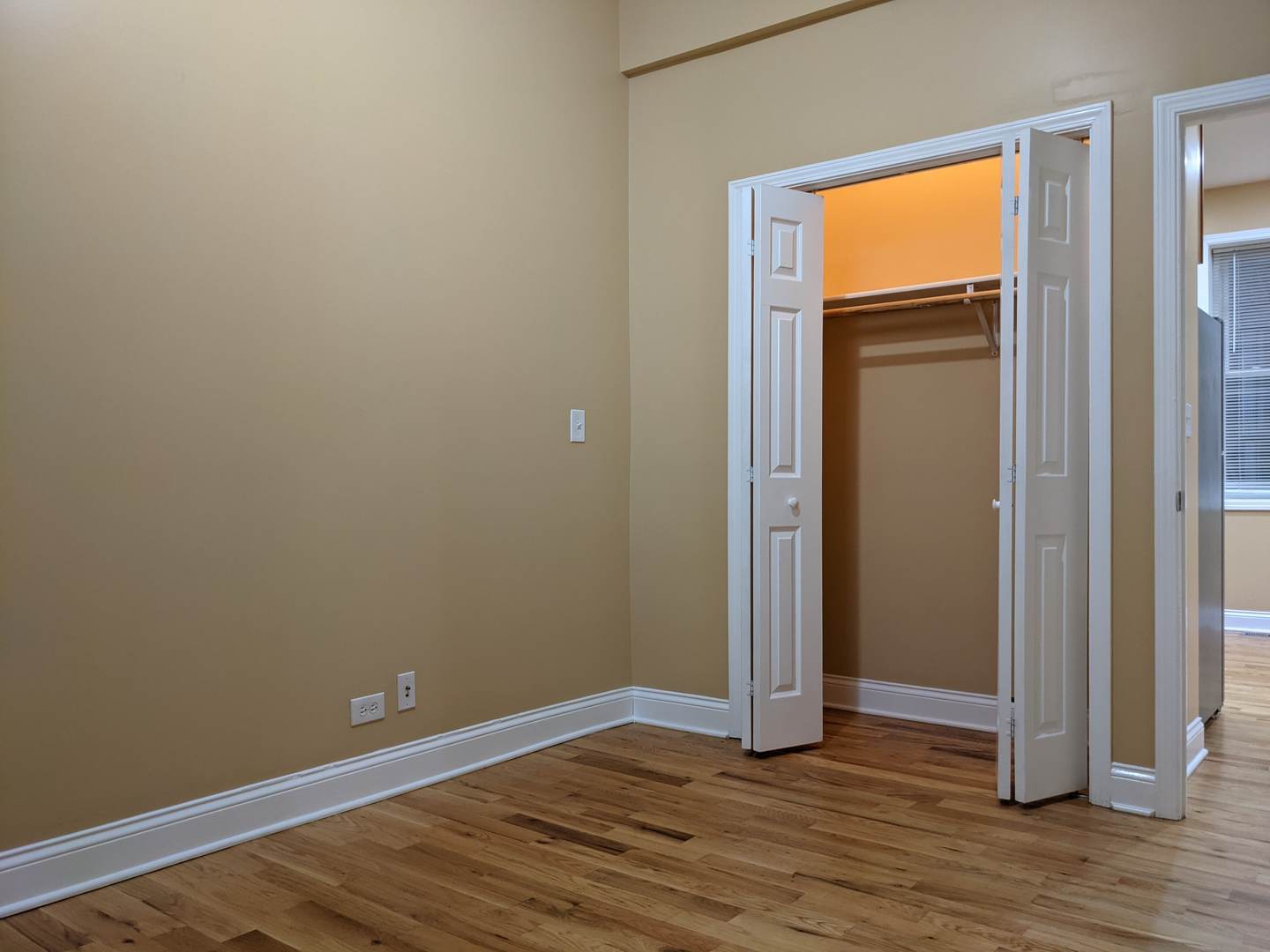 712 South Aberdeen Street, Unit 1A Chicago, IL 60607 - Photo 7 of 28 a view of empty room with wooden floor and closet