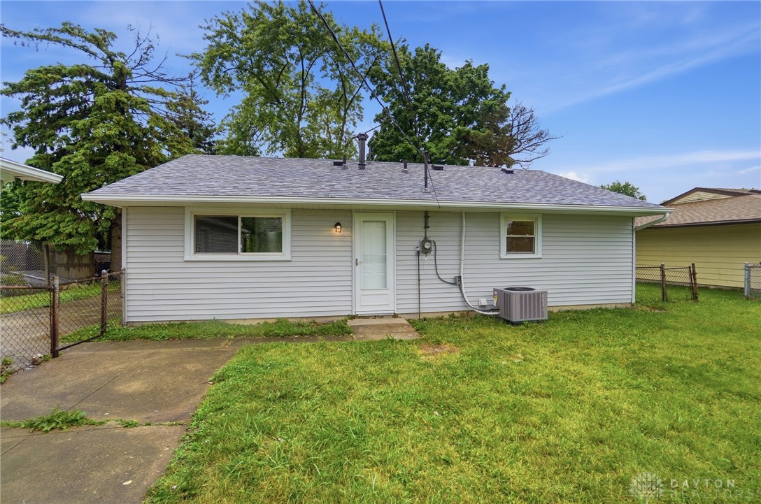 1923 Portage Path Springfield, OH 45506 - Photo 33 of 40 Well-maintained backyard featuring a simple lawn and convenient rear entry.