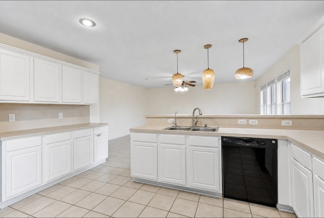 11430 Moonlight Ridge Drive Humble, TX 77396 - Photo 6 of 15 a kitchen with a sink and cabinets