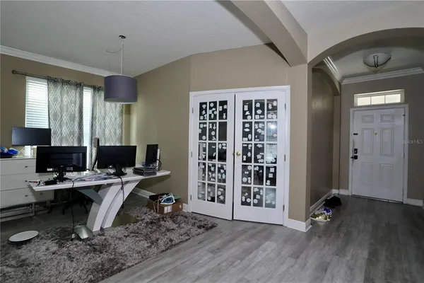 a workspace with furniture and window