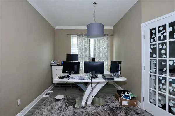 a workspace with furniture and window