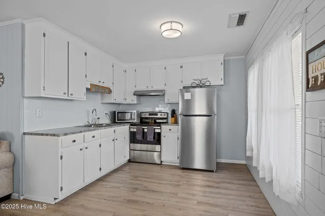 $995,000 | 205 Barefoot Lane, Atlantic Beach, NC 28512