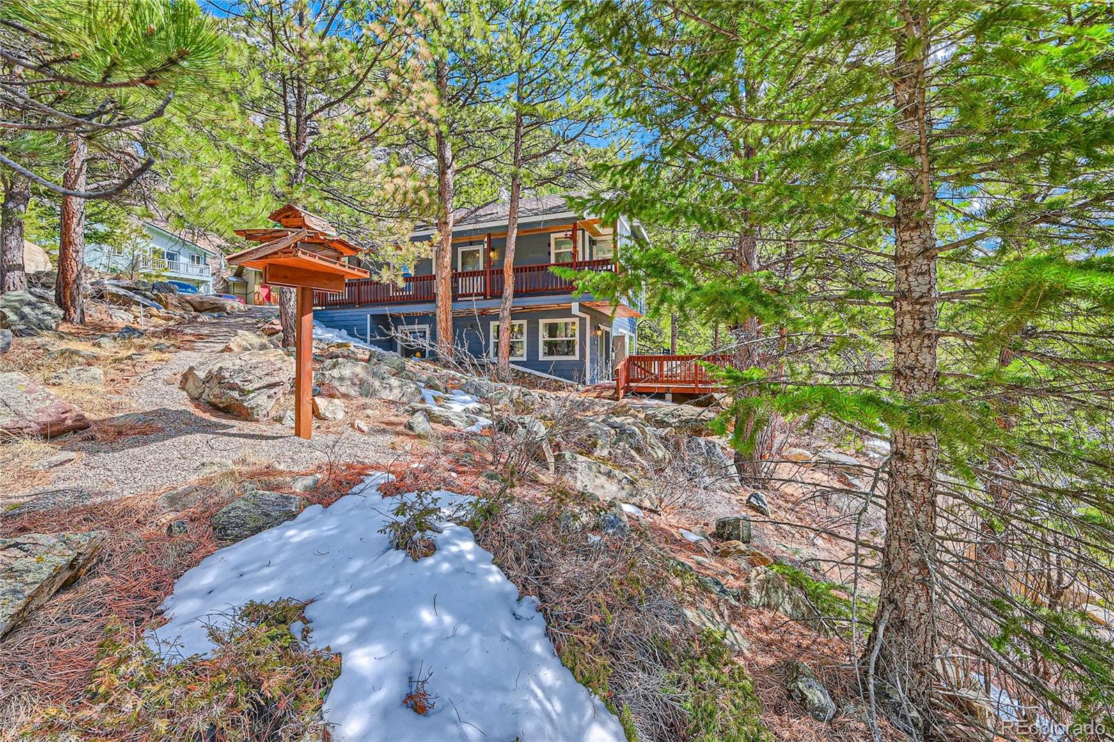 Skyline Road Georgetown, CO 80444 - Photo 3 of 4 a tree in the middle of a yard