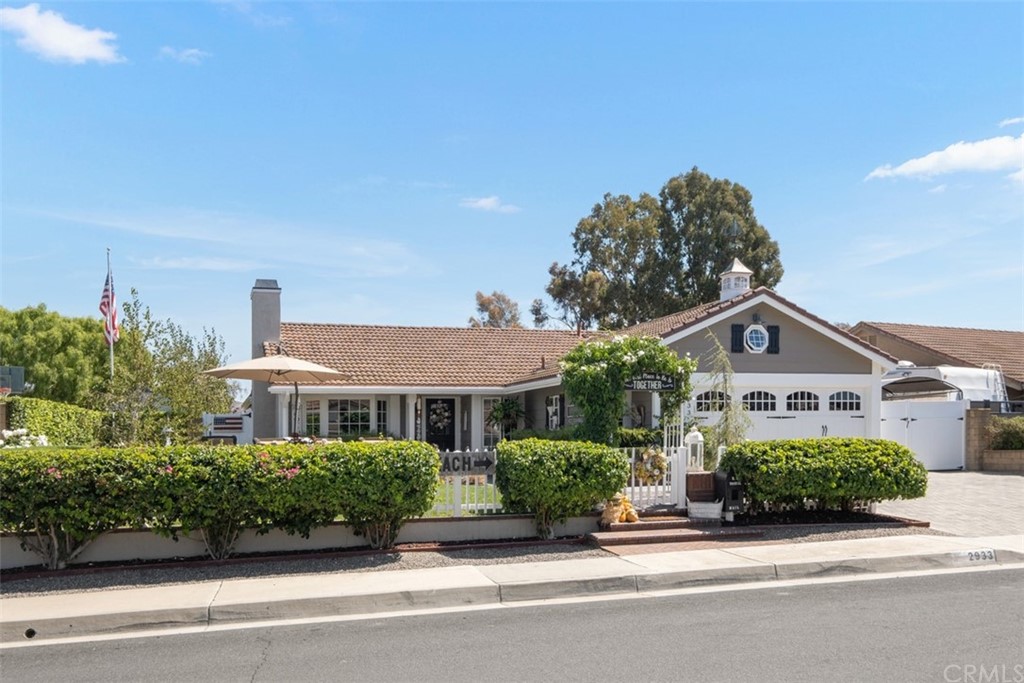 2933 Estancia San Clemente, CA 92673 - Photo 1 of 59 front view of a house with a small yard