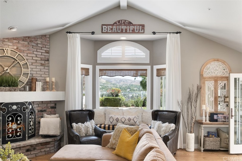 2933 Estancia San Clemente, CA 92673 - Photo 21 of 59 a living room with furniture and a large window