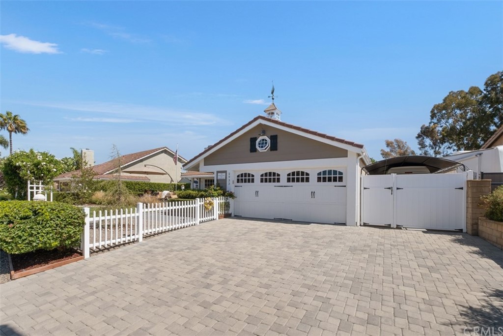 2933 Estancia San Clemente, CA 92673 - Photo 4 of 59 a view of a house with a yard and fence